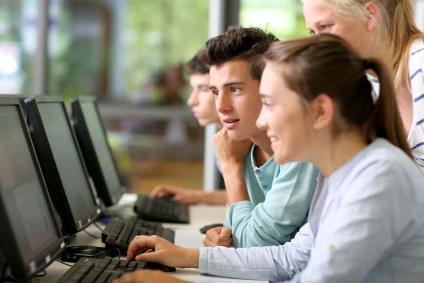 Students working on desktop computers