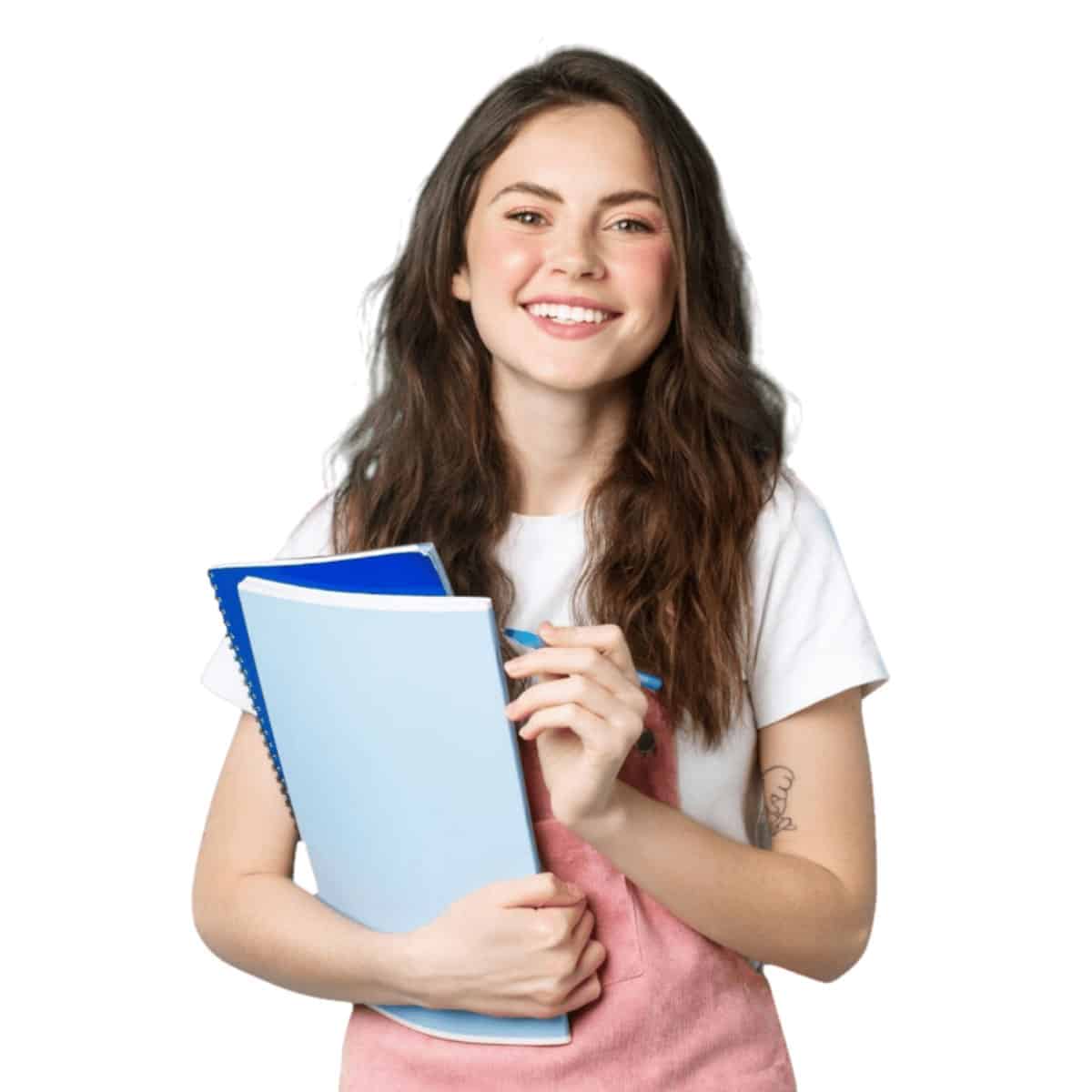 Female student smiling and holding books