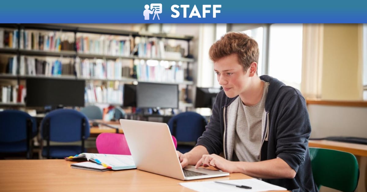 Student getting quiz results on laptop